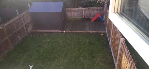 an aerial view of a backyard with a playground at Morayo in Sandal and Walton