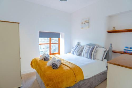 Voodi või voodid majutusasutuse Finest Retreats - Rosemary Cottage toas