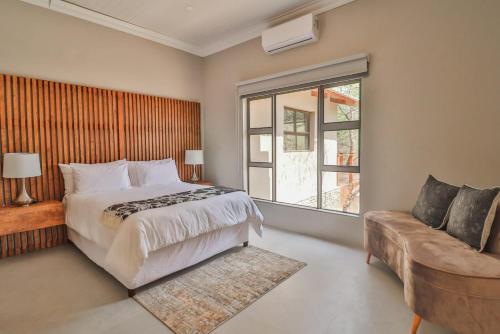 Postel nebo postele na pokoji v ubytování 2219 Kruger Wild