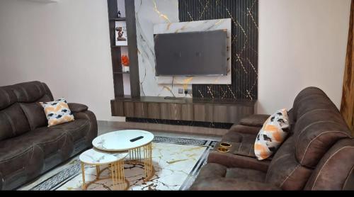 Afbeelding uit fotogalerij van Moonshine walkers furnished apartments in Munyu