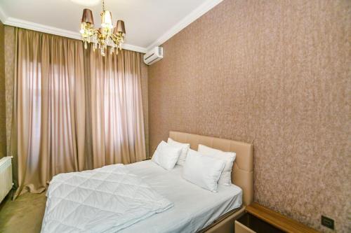 Llit o llits en una habitació de Nizami garden