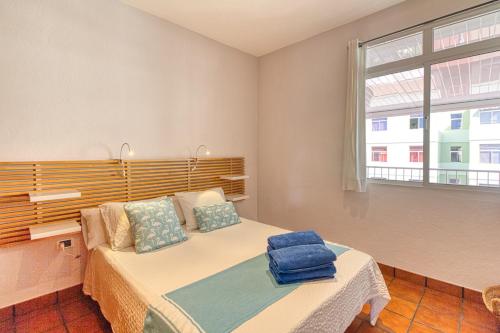 Voodi või voodid majutusasutuse Atico Lua toas