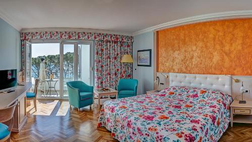 Postel nebo postele na pokoji v ubytování Hotel Miramar