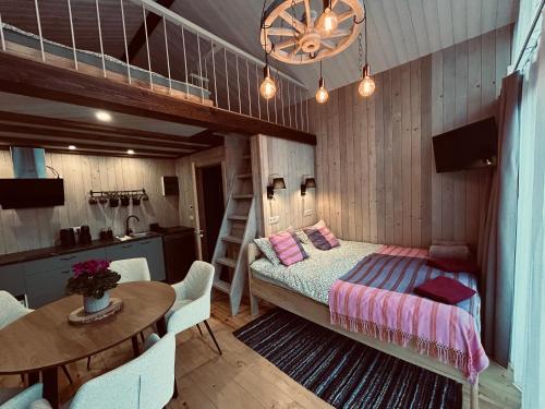 Ένα ή περισσότερα κρεβάτια σε δωμάτιο στο Braslas čuksti