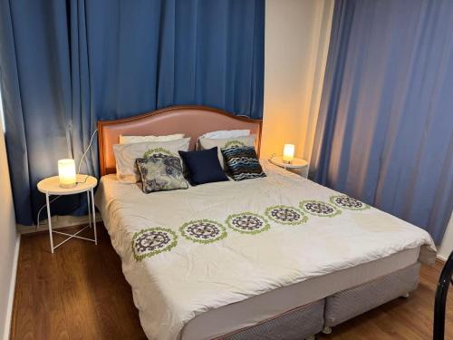 Postel nebo postele na pokoji v ubytování MetaWise Charming Retreat at Huntingdale E4