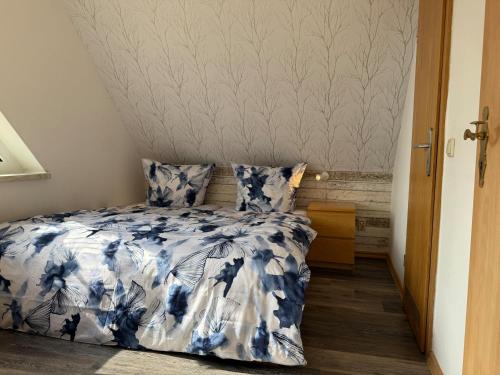 Postel nebo postele na pokoji v ubytování Pension Hirschburg Apartment 4 - Dierhagen