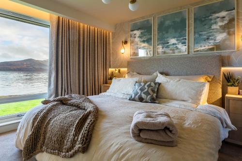 Ένα ή περισσότερα κρεβάτια σε δωμάτιο στο The Shore House
