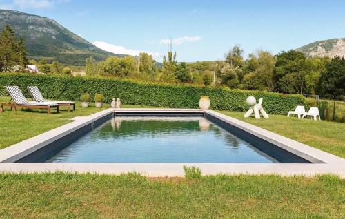 a swimming pool in the middle of a yard at Maison Avec Piscine in La Roque-Esclapon