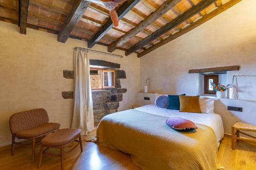 Postel nebo postele na pokoji v ubytování Mas Terrers