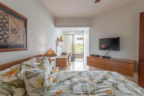 Ένα ή περισσότερα κρεβάτια σε δωμάτιο στο 1BR Mauna Lani Point lovely mountain views