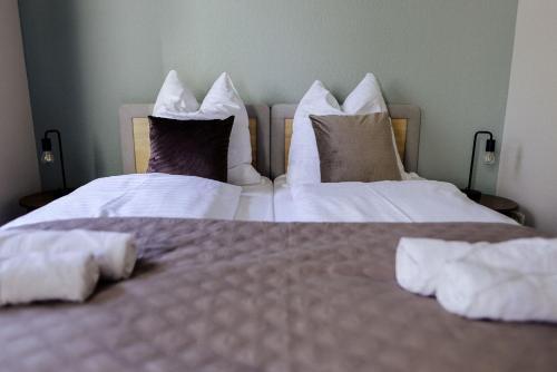 Postel nebo postele na pokoji v ubytování Neu renoviert I zentrale EG-Wohnung I 4 Personen, salt apartments