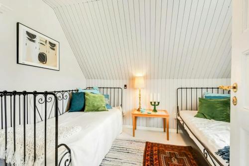 Ένα ή περισσότερα κρεβάτια σε δωμάτιο στο Skipper House With Views Of The North Sea