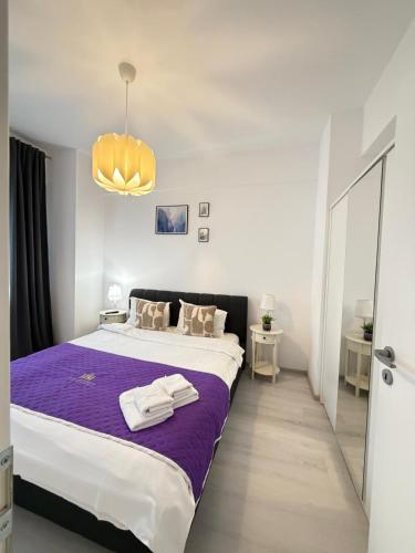 Postel nebo postele na pokoji v ubytování TOD APARTMENTS Palas Mall