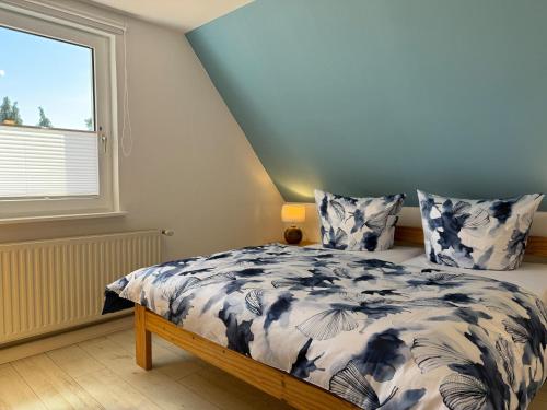 Postel nebo postele na pokoji v ubytování Pension Hirschburg Apartment 7 - Altheide