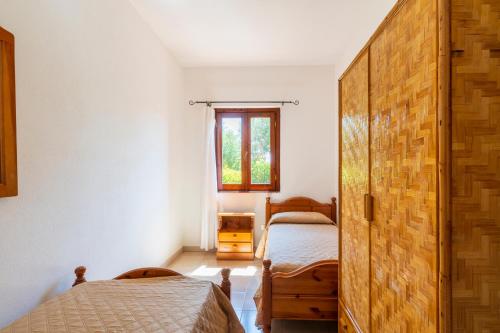 Ένα ή περισσότερα κρεβάτια σε δωμάτιο στο Residence Oasi e Oasi Blu