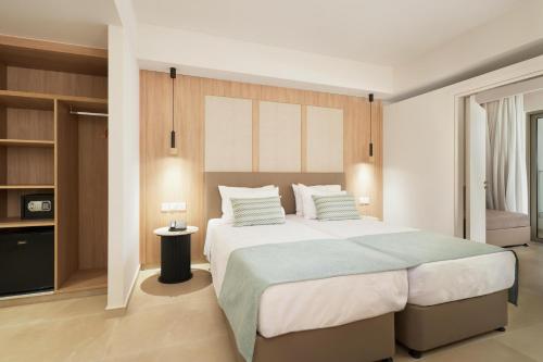 Postel nebo postele na pokoji v ubytování Maris Grand Waterpark Resort