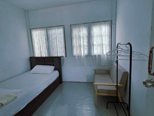 Postel nebo postele na pokoji v ubytování มานอนนี่แคมป์ เขาค้อ