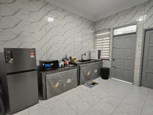 Η κουζίνα ή μικρή κουζίνα στο Vi Sweet Home Airport