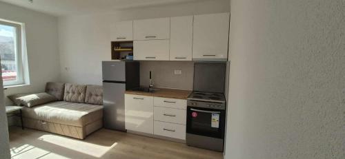 Kuchyň nebo kuchyňský kout v ubytování TESLA 132 Apartment 9