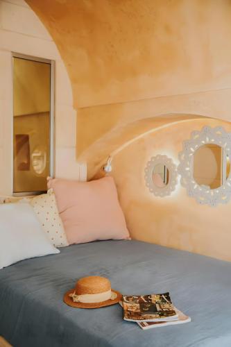 Ένα ή περισσότερα κρεβάτια σε δωμάτιο στο Grotta Angolo Laggetto