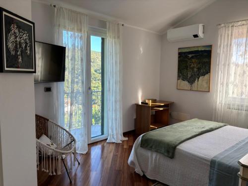 Ένα ή περισσότερα κρεβάτια σε δωμάτιο στο La Vivenda