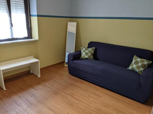 Ein Sitzbereich in der Unterkunft Mola Mola Beach House