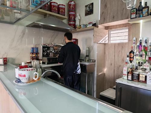 Příslušenství pro přípravu čaje a kávy v ubytování AparthouseRisorgimento CANAPA