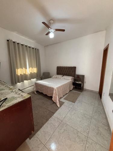 Postel nebo postele na pokoji v ubytování Casa com Vista de Caxambu