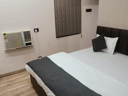 Ένα ή περισσότερα κρεβάτια σε δωμάτιο στο Hotel MRK VILLA