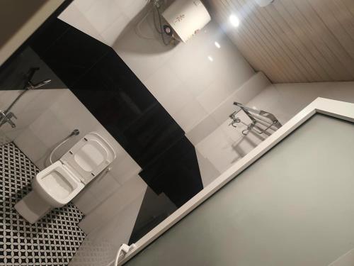 Ένα μπάνιο στο Hotel MRK VILLA