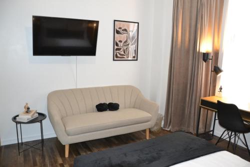 Et tv og/eller underholdning på 1 Bed Apartment - 3 Guests - Free parking- Kids welcome