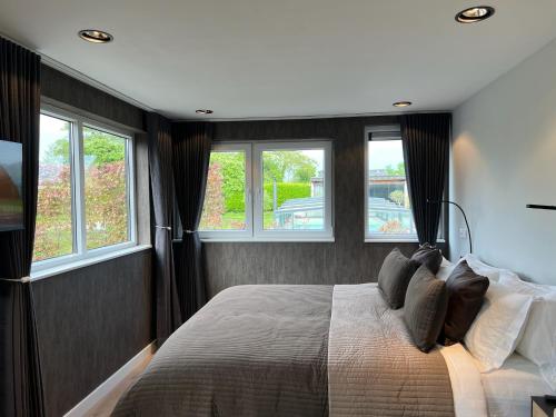 Postel nebo postele na pokoji v ubytování Bed and Breakfast Roodkapje