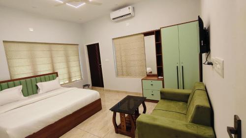 Postel nebo postele na pokoji v ubytování Oasia Resort