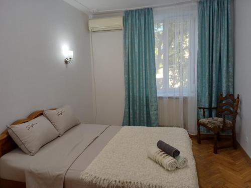 Ένα ή περισσότερα κρεβάτια σε δωμάτιο στο Your apartment in the heart of Chisinau
