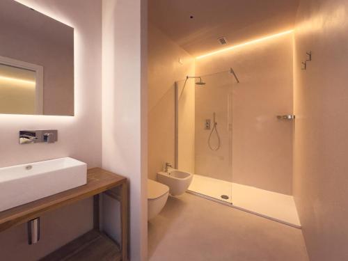a bathroom with a shower and a toilet and a sink at Dimora in Prato in Padova