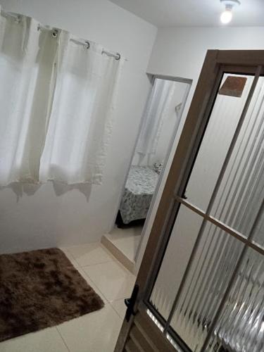 Postel nebo postele na pokoji v ubytování Kit net para curta temporada