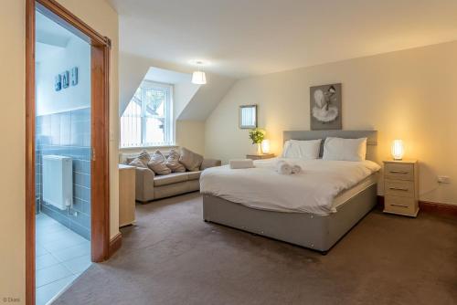 Postel nebo postele na pokoji v ubytování Sycamorwydden