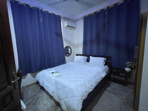 Cama o camas de una habitación en JD Hotel