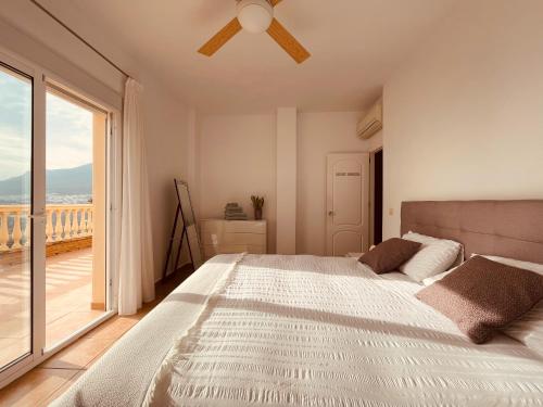 Ένα ή περισσότερα κρεβάτια σε δωμάτιο στο Villa Montaña Mimosa