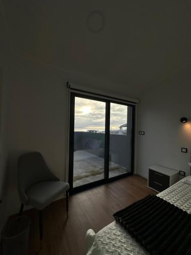 Een bed of bedden in een kamer bij The Mill House