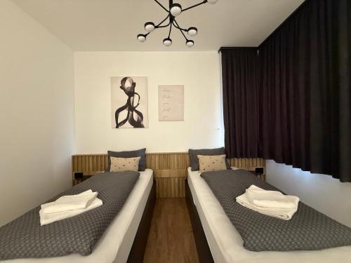 Ένα ή περισσότερα κρεβάτια σε δωμάτιο στο BokorLak Nature & City 1