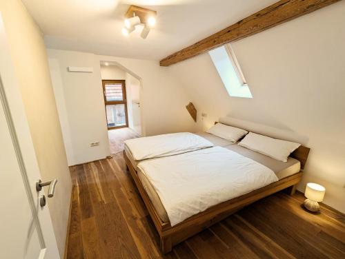 Ένα ή περισσότερα κρεβάτια σε δωμάτιο στο Ferienhaus am Gässchen