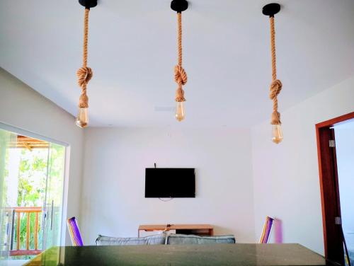 Μια τηλεόραση ή/και κέντρο ψυχαγωγίας στο Apartamento Exclusivo Inteiro perto da Vila - Barra Grande Beach Stay