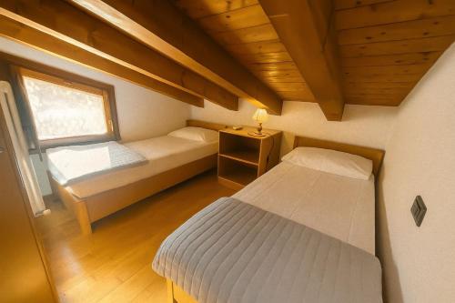 Postel nebo postele na pokoji v ubytování Alessia