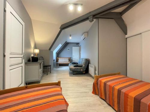 Postel nebo postele na pokoji v ubytování Au casterot