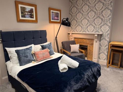 Postel nebo postele na pokoji v ubytování Regency House