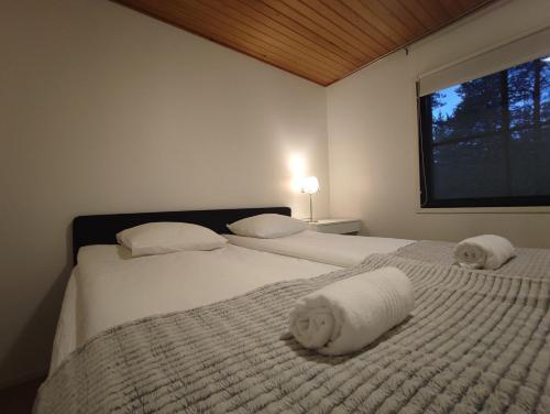 Postel nebo postele na pokoji v ubytování Talitintti Levi, 1 bedroom apartment, family friendly