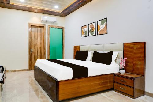 Postel nebo postele na pokoji v ubytování Hotel O Lax