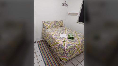 En eller flere senge i et værelse på Maracanaú: Apto 2Q Wi-Fi 30 min Beach Park