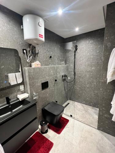 Ένα μπάνιο στο Naturalia Appart & Hotel - Casa Center